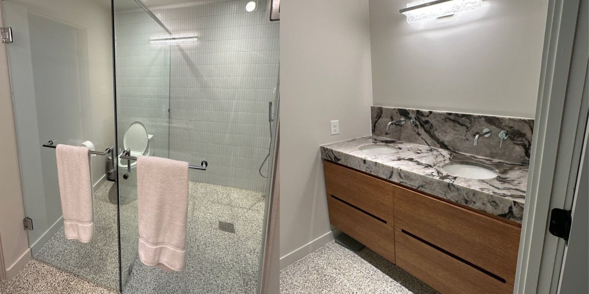 Modern bathroom remodel in San Antonio by Wade Caldwell featuring walk-in glass shower and double vanity with marble countertops