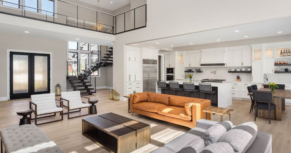 Open-concept living room and kitchen renovation in San Antonio by Wade Caldwell Construction with modern finishes and h