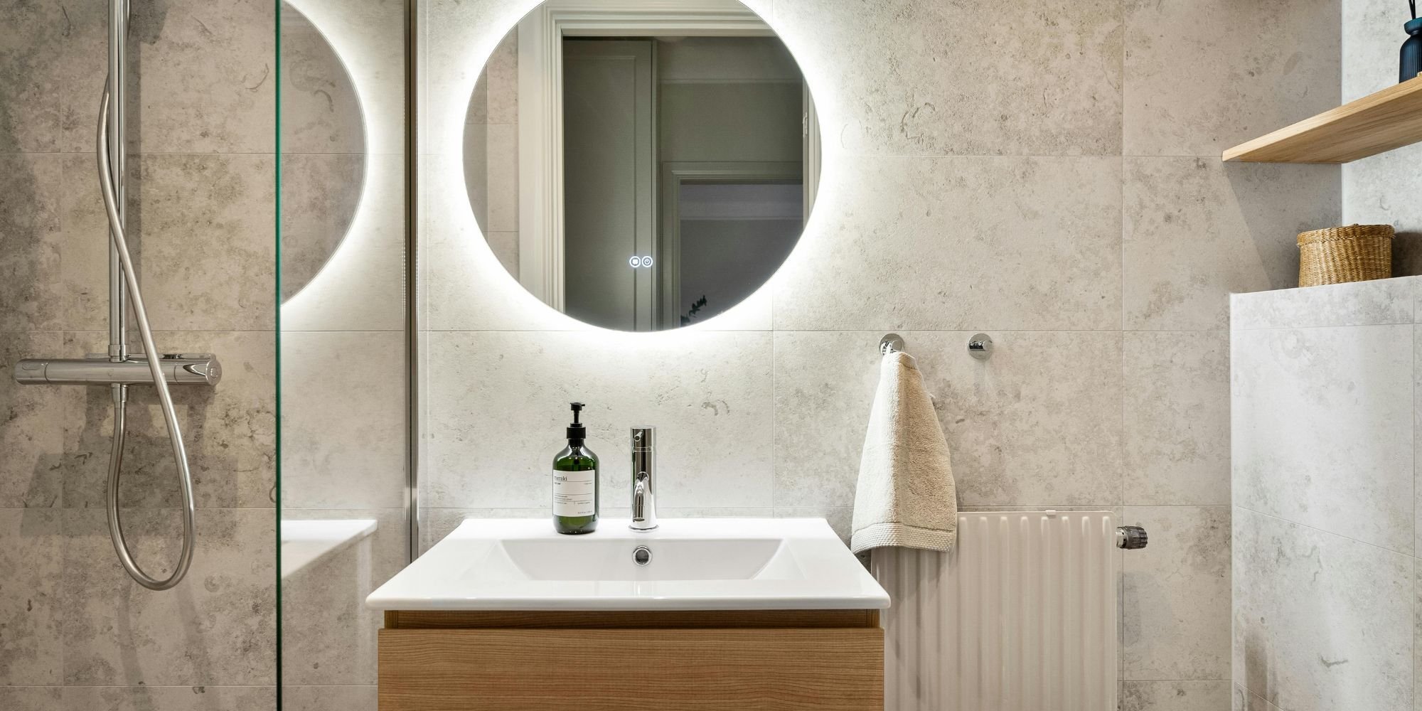 Accent lighting in a bathroom remodel by Wade Caldwell in San Antonio