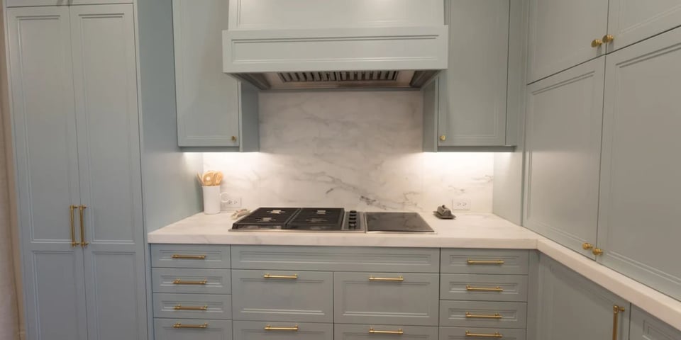 San Antonio kitchen remodel featuring soft-close cabinets and gold hardware by Wade Caldwell Construction.