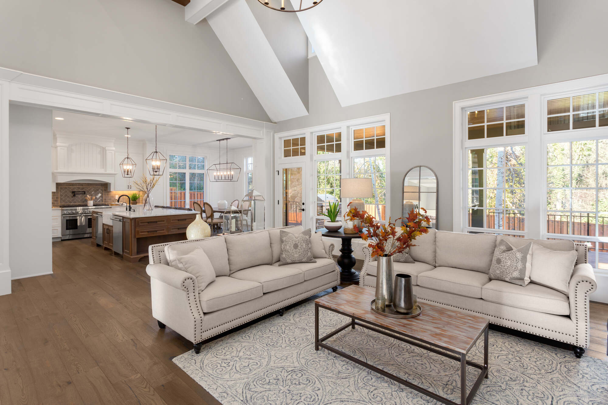 Living room and kitchen renovation with cathedral ceilings by Wade Caldwell Construction in Terrell Hills, TX